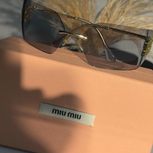 Miu Miu MU 54YS rimless gold sunglasses with dark grey lenses